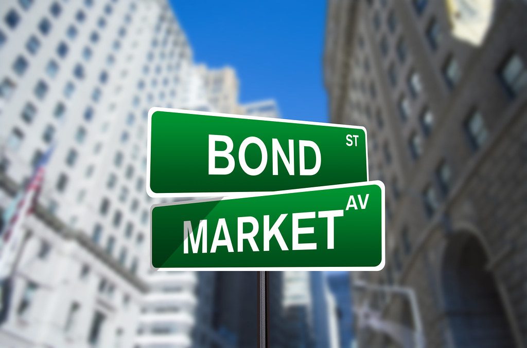 "Bond Market Wall Street Sign" by investmentzen (licensed under CC BY 2.0)